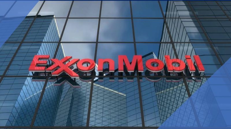 Opening storyboard frame: the ExxonMobil logo on a glass office tower against blue sky