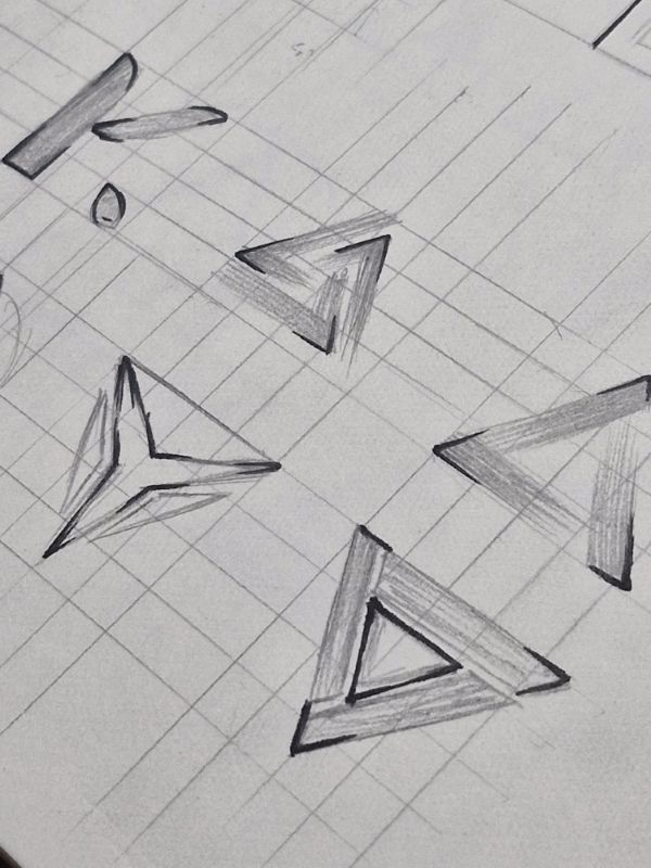 Sketches of impossible triangles, a three-blade mark and a K monogram